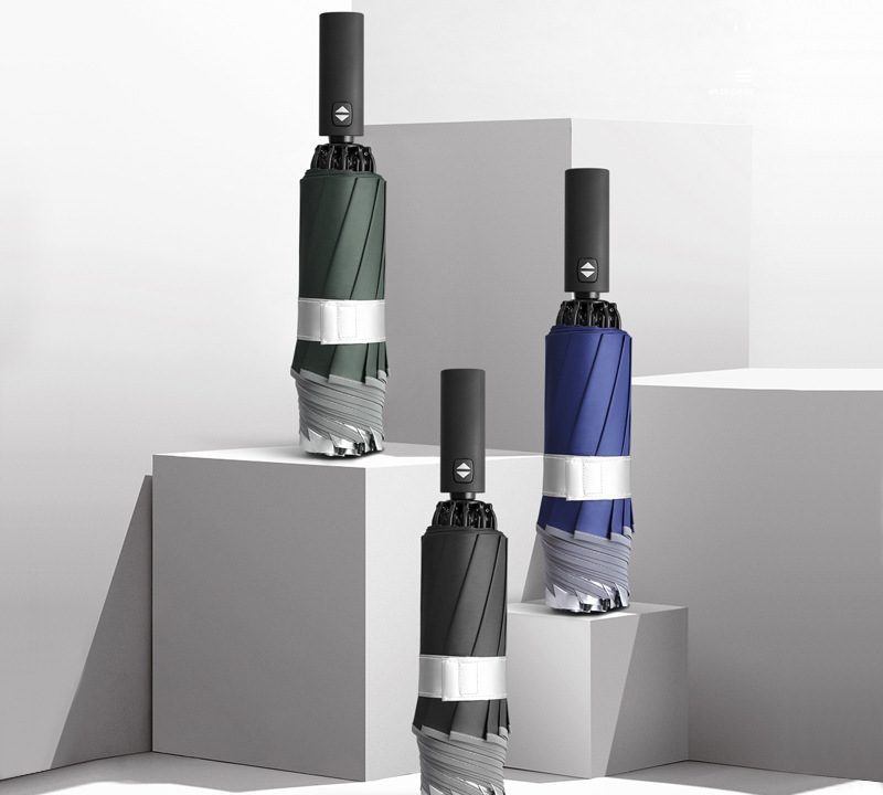 Black, green, and blue 10-rib fully automatic reverse umbrellas with LED handles and reflective trim